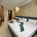 اتاق چهارتخته رویال (دو تخته + کاناپه تخت شو) هتل قدس مشهد