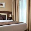 یک تخته هتل ریحان روتانا (Rayhaan Rotana) کربلا