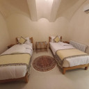 اتاق چهارتخته پرویس اقامتگاه سنتی رزاس کاشان