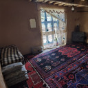 اتاق چهارنفره کف خواب اقامتگاه بومگردی واران سنندج