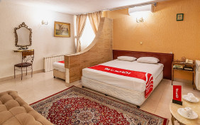 اتاق چهارتخته(سه تخته+کاناپه) هتل امینیان مشهد