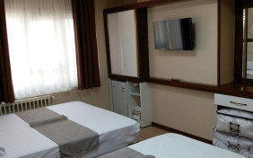 اتاق چهار تخته(دبل+دو تا سینگل) vip مهمانپذیر سهند تهران