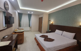 اتاق سه تخته(دوتخته+نفراضافه) هتل پارسیان یزد