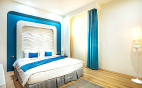 سوئیت یک خوابه چهارتخته بدون پنجره هتل رویال پارک سرعین